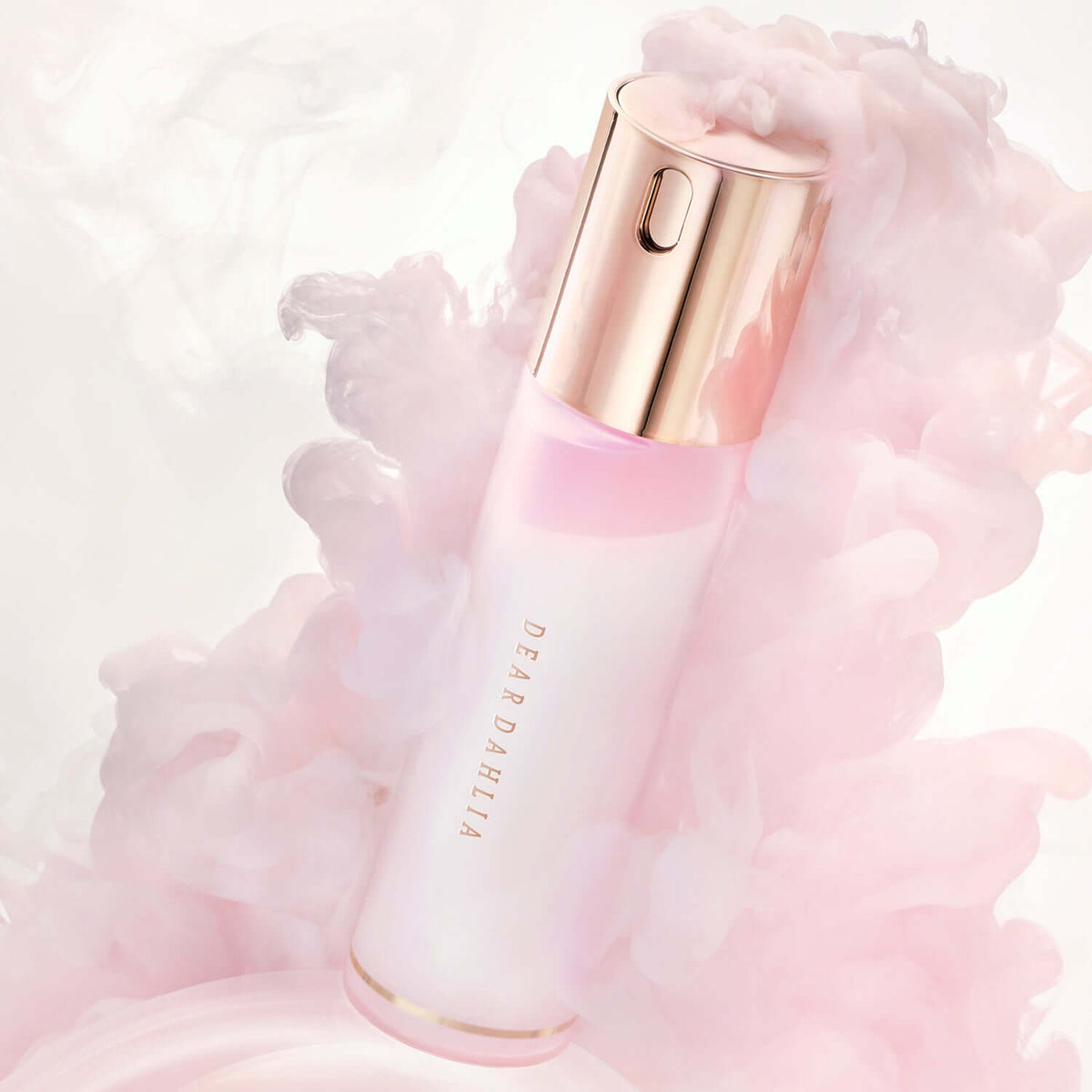 DEAR DAHLIA Endless Skin Cream Mist in elegant pink and golden bottle surrounded by soft pastel clouds for a luxurious feel
