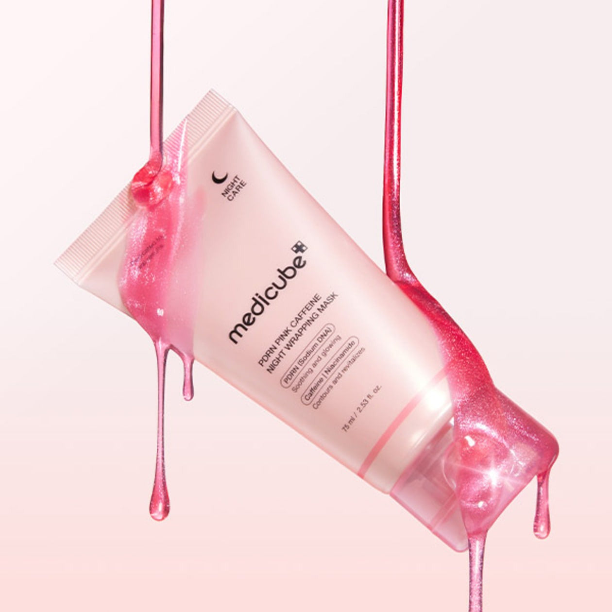 MEDICUBE PDRN Pink Caffeine Night Wrapping Mask 75ml with pink liquid on a pastel background