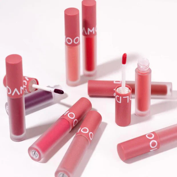 MOOLDA Glow Dewy Tint lip products in various shades, showcasing vibrant, moisturizing colors ideal for a dewy lip look.