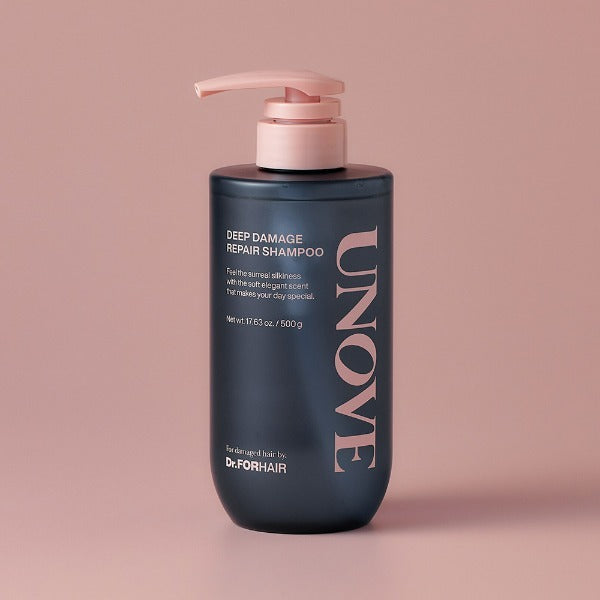 UNOVE Deep Damage Repair Shampoo 500ml bottle on a pink background