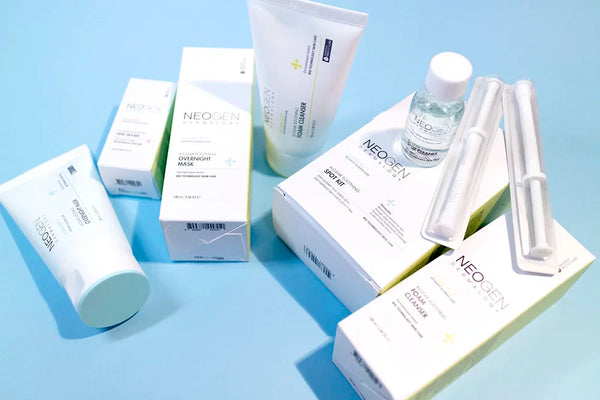 Embracing Evolution: Discovering the Innovation of NEOGEN in Korean Skincare products displayed on a blue background.