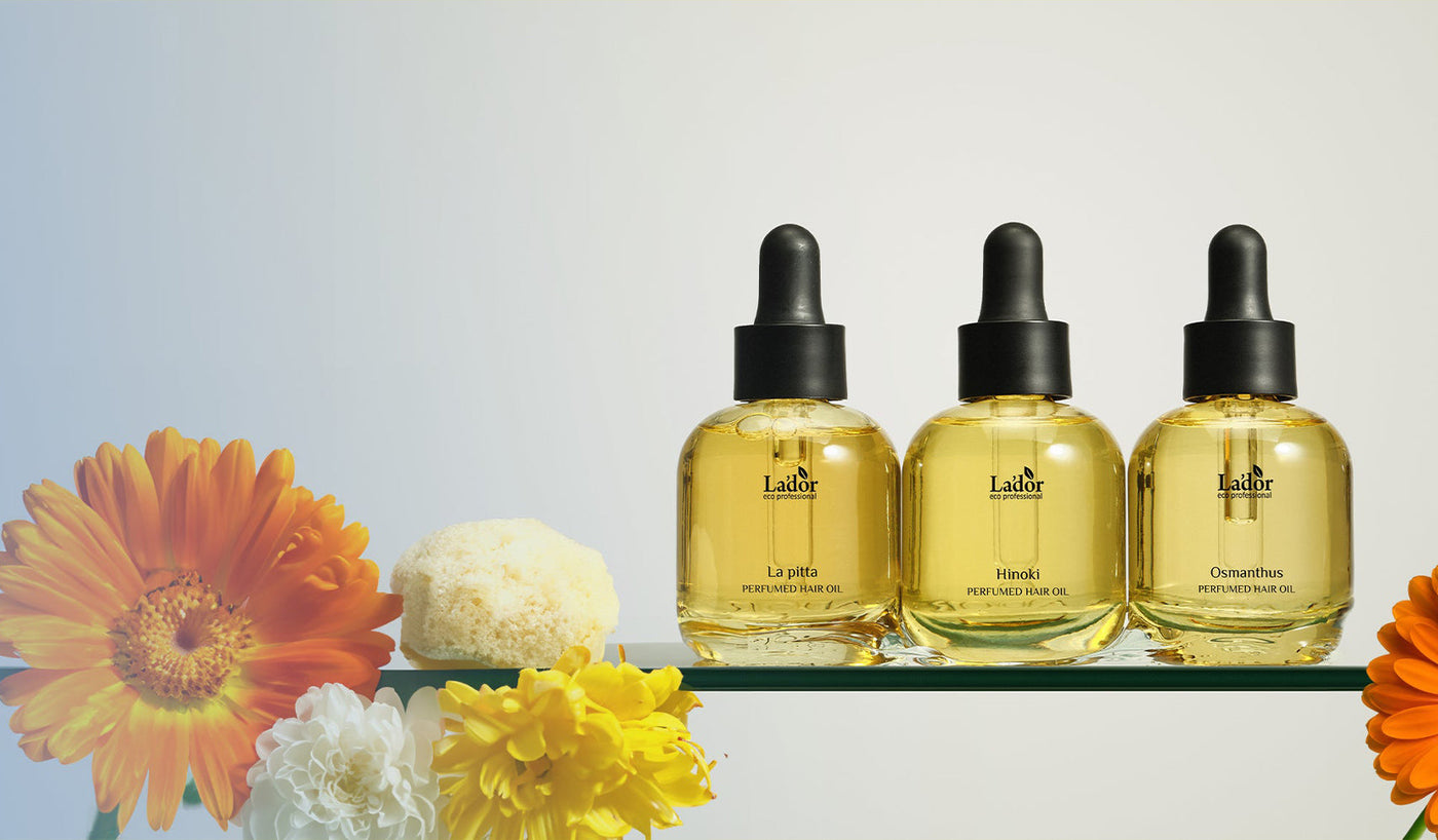 L'ADOR skincare serum bottles with flowers - Experience Radiant Skin with L'ADOR: The Korean Skincare Brand Transforming Beauty