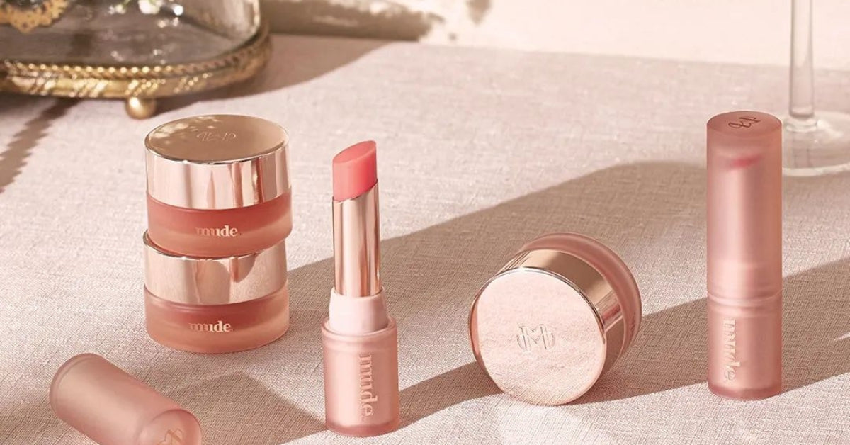 Mude: Your Minimalist Makeup Artiste for Effortless Elegance! showcasing elegant makeup collection on a stylish display.