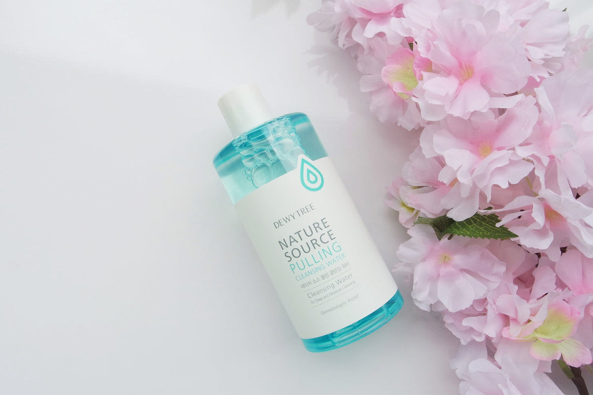 Embrace Nature's Nectar: Unveiling the Enchanting World of DEWY TREE Skincare with Nature Source Pulling product and pink flowers.