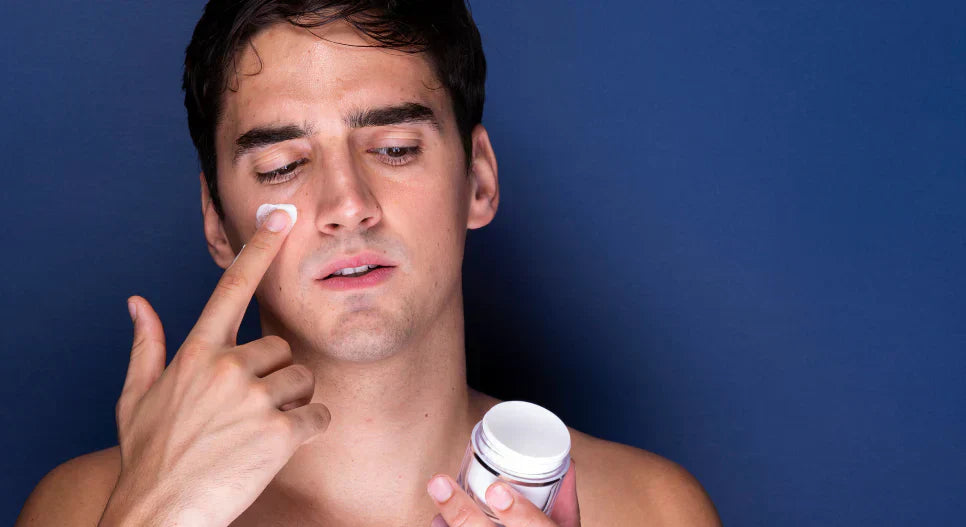 Man applying cream, highlighting why Korean cosmetics are better for men’s skin than Western brands.