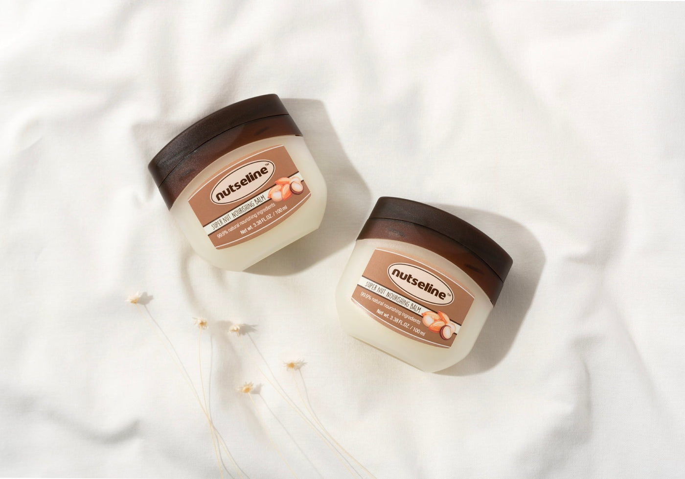 Revitalize Your Skin with NUTSELINE’s Top Products - Two jars of NUTSELINE skincare cream on a white background