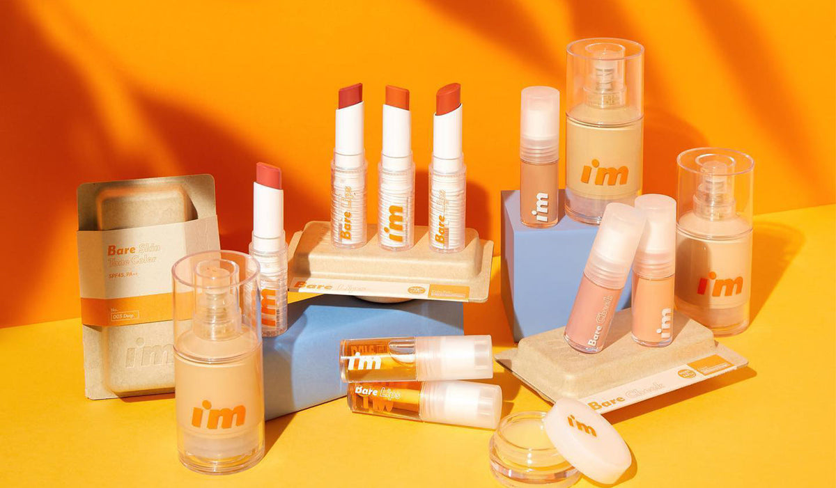 Discover the Charm of I'M MEME: A New Wave in Korean Cosmetics, featuring colorful lipsticks and skin products on display.