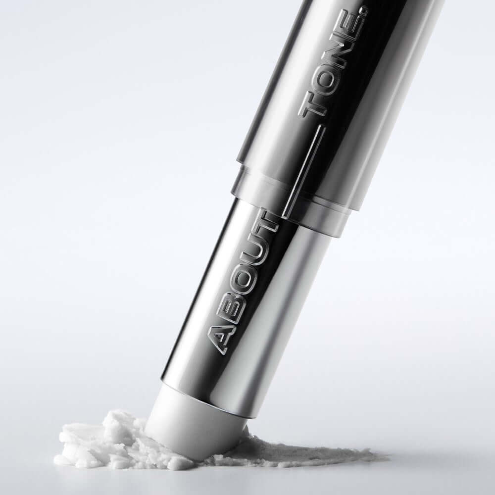 ABOUT TONE Blur Lasting Stick Primer for flawless makeup application, silver packaging with product texture shown.