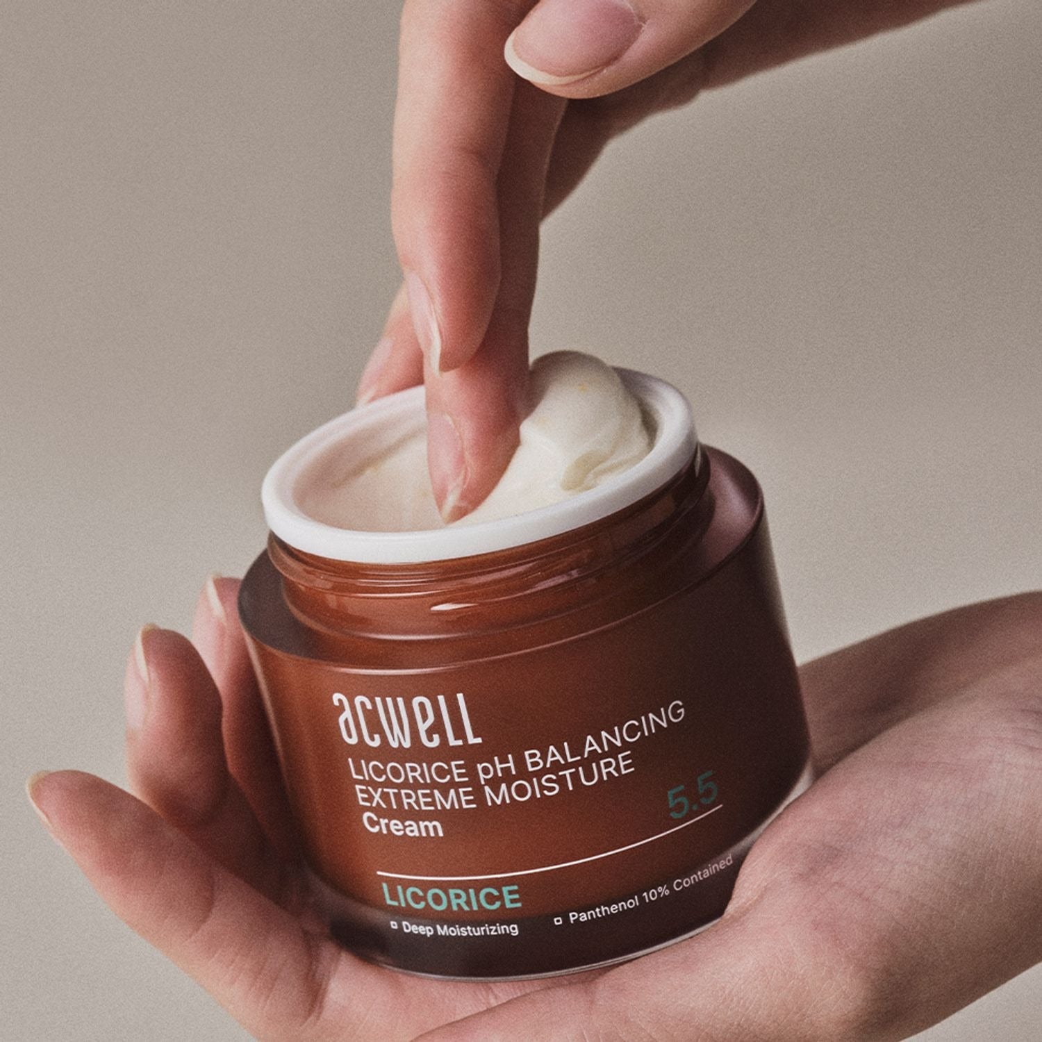 ACWELL Licorice pH Balancing Extreme Moisture Cream 55ml in open jar on hand.