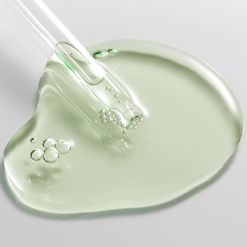 Texture of ACWELL Tea Tree Blemish Control PDRN Ampoule 80ml with glass dropper.