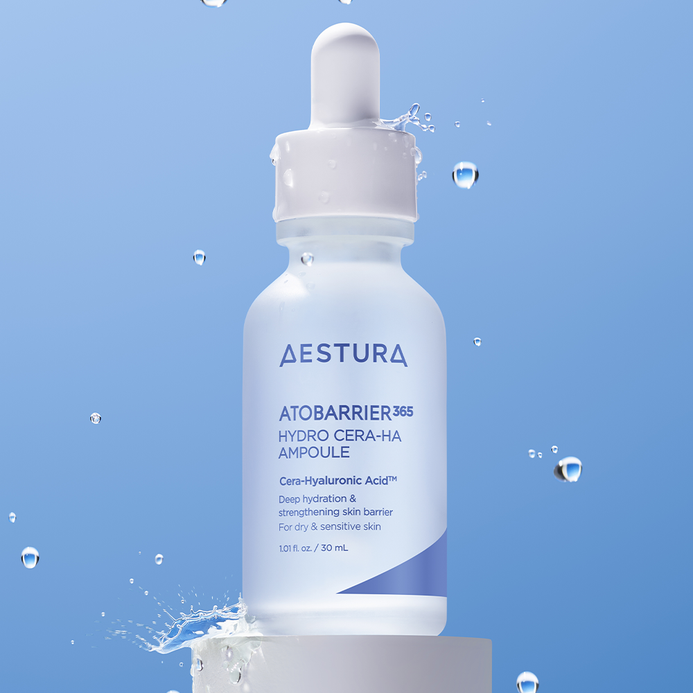 AESTURA Atobarrier 365 Hydro Cera-HA Ampoule 30ml bottle against blue background, featuring deep hydration for dry and sensitive skin.