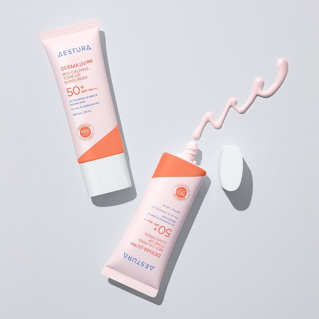 AESTURA Derma UV365 Red Calming Tone-Up Sunscreen 40ml tubes with cream on a light surface.