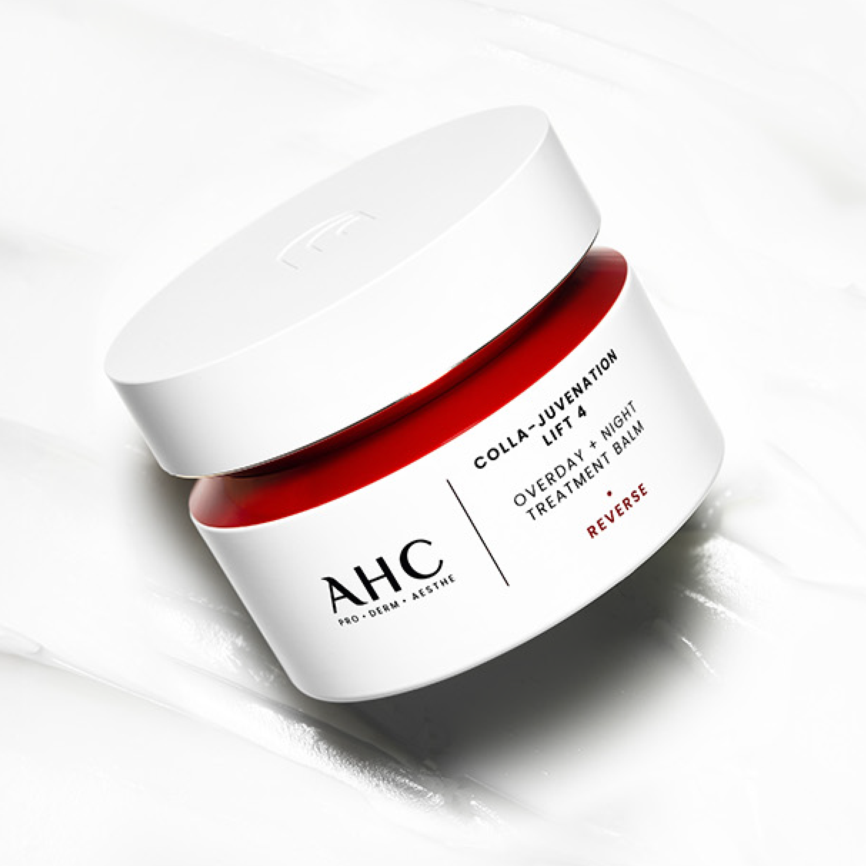 AHC Cola Juvenation Lift 4 Overday Night Treatment Balm 50ml in white jar on textured surface