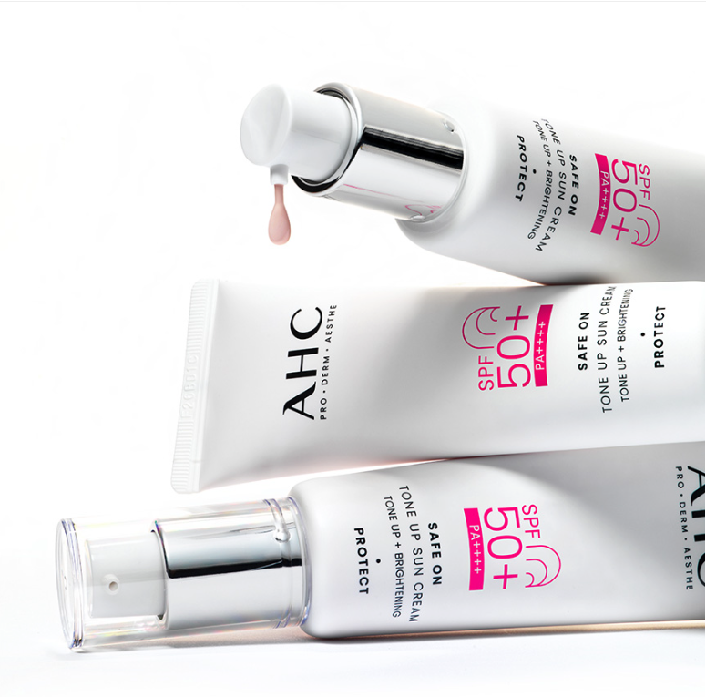 AHC Safe On Tone-Up Sunscreen 50ml SPF 50+ bottles displayed with cream texture.