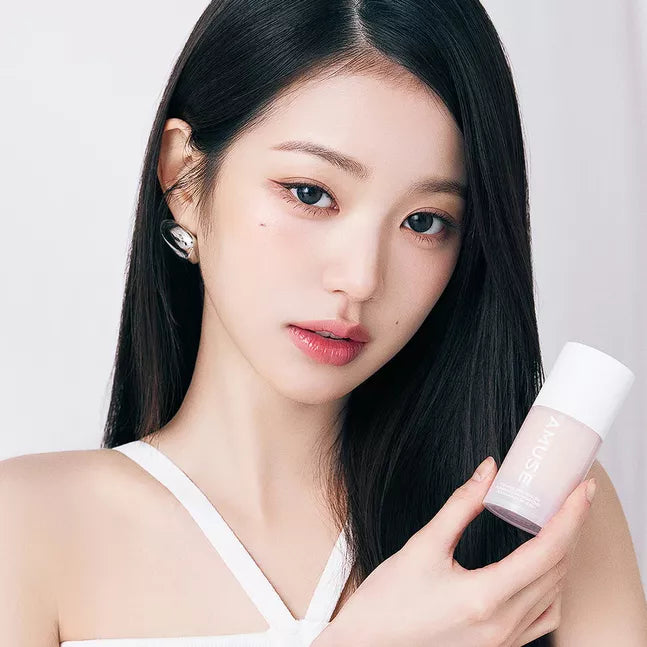 Model showcasing AMUSE Ceraamic Skin Perfection Foundation in a makeup look.