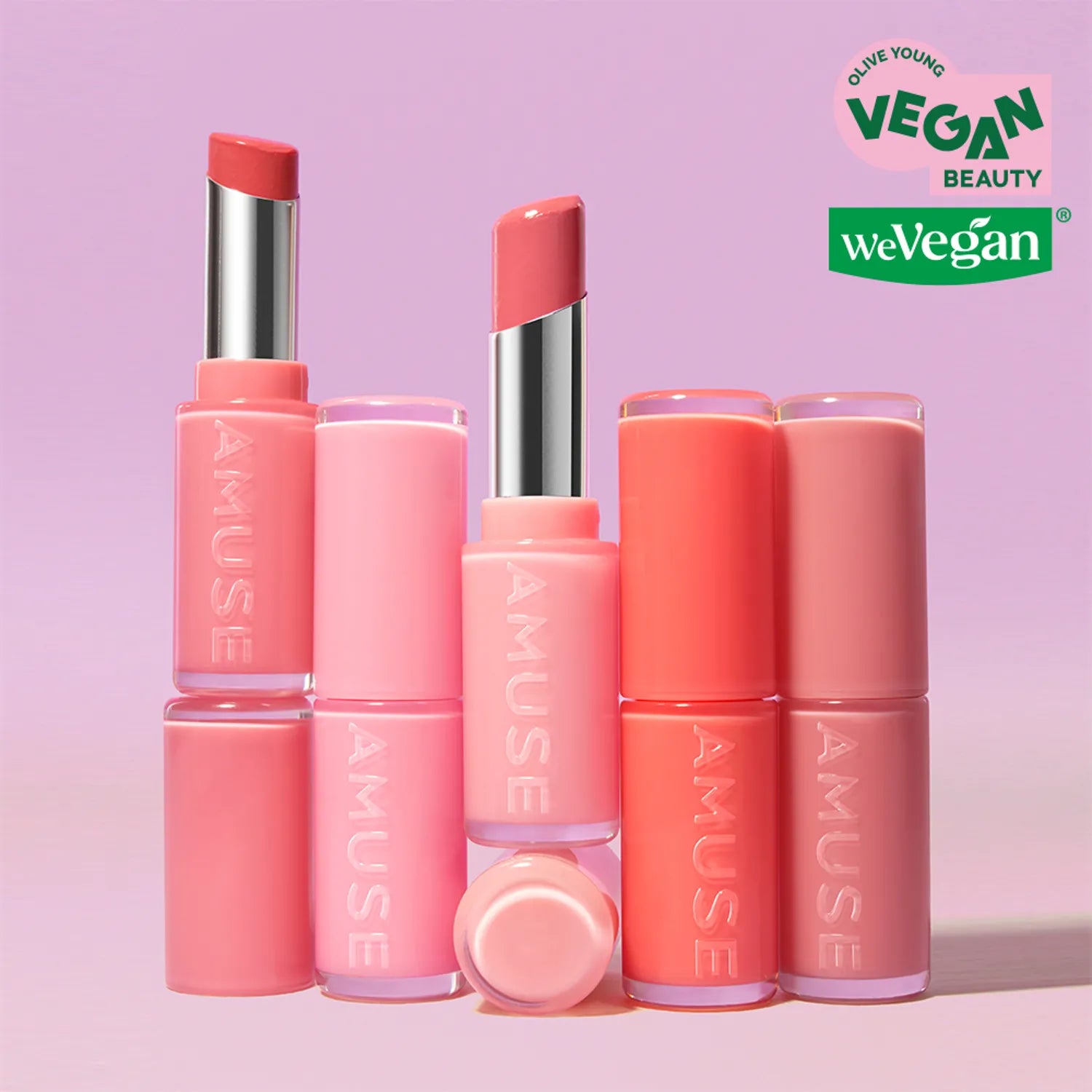 AMUSE Fondue Balm lipsticks in various shades with vegan certified labels.