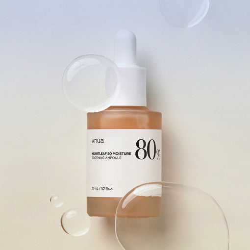 ANUA Heartleaf 80 Moisture Soothing Ampoule 30ml bottle with product label and clear liquid droplets, highlighting skincare product.