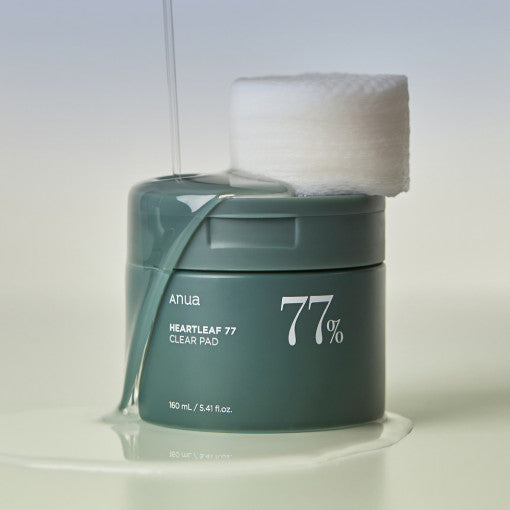 ANUA Heartleaf Clear Pad 77% 160ml skincare product with heartleaf extract, showcasing the pad and jar design.