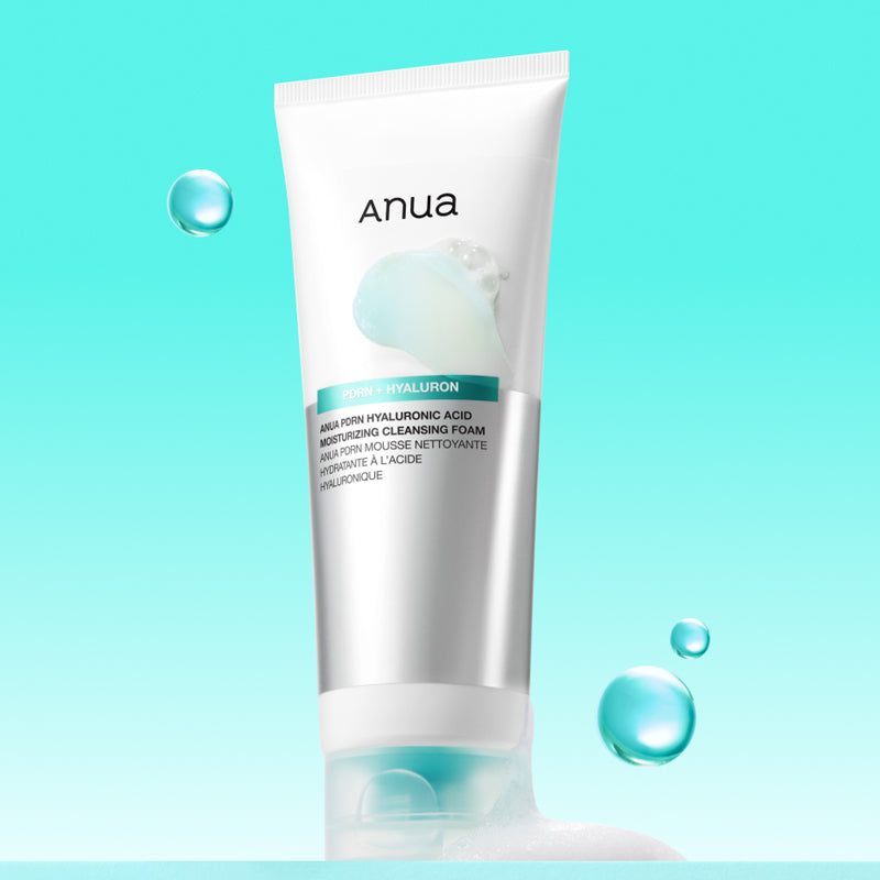 ANUA PDRN Hyaluronic Acid Moisture Cleansing Foam 150ml tube on a blue background with water bubbles.