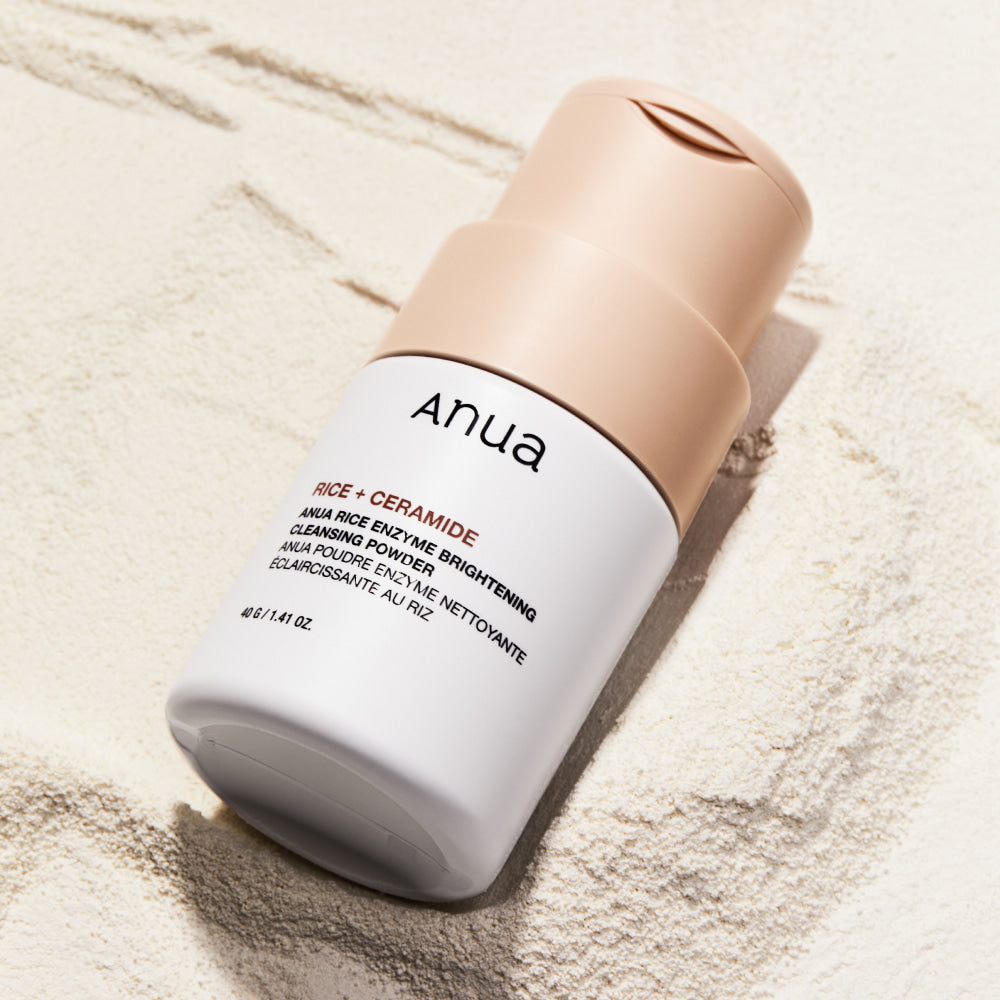 ANUA Rice + Ceramide Brightening Cleansing Powder product bottle on textured surface