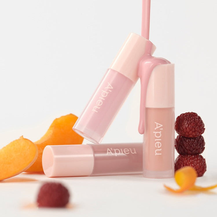 A'PIEU Juicy Pang Bear Cream Blusher Mini with vibrant fruit accents showcasing a playful and colorful makeup collection.