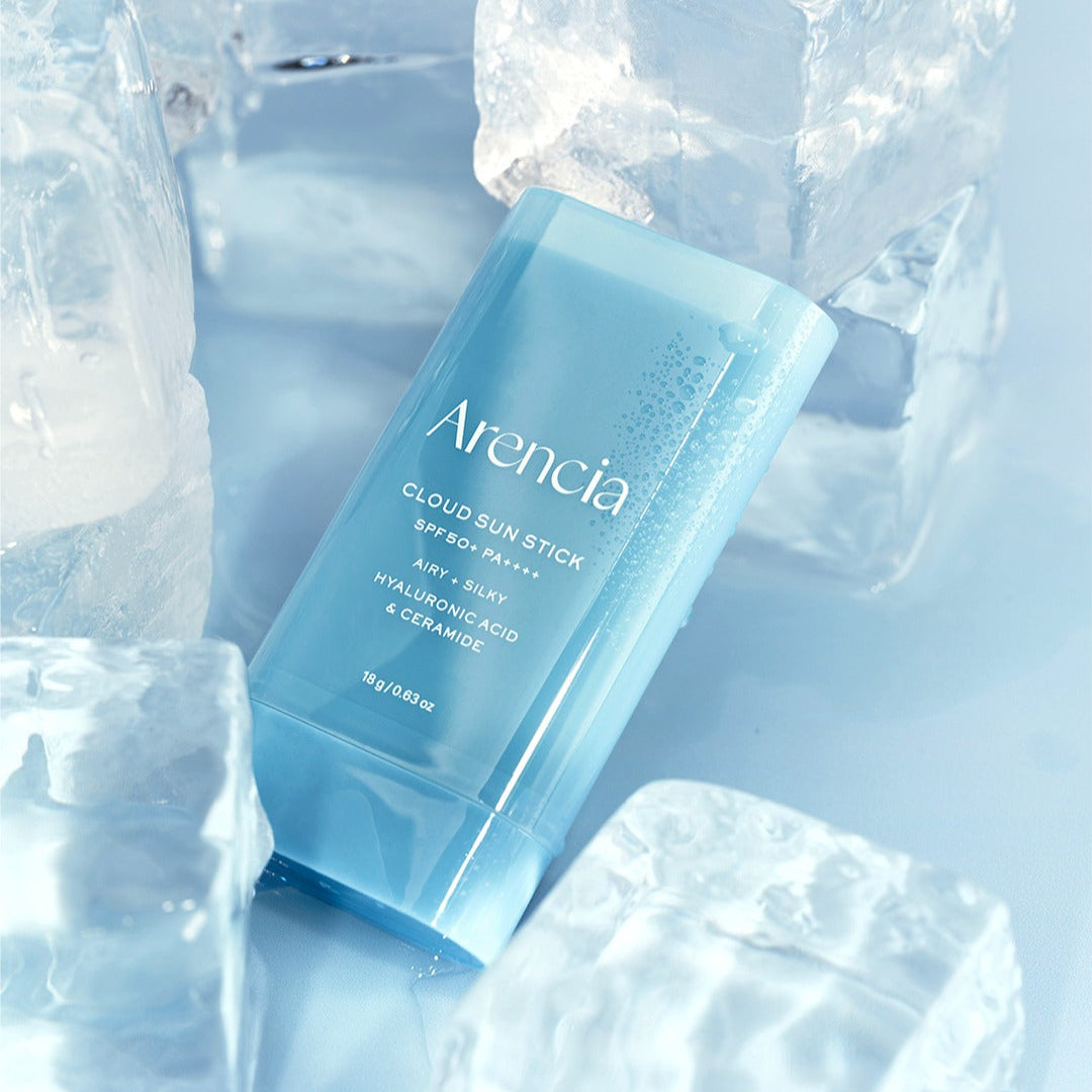 ARENCIA Cloud Sun Stick 18g surrounded by ice cubes, SPF 50+ with hydrating hyaluronic acid and ceramide.
