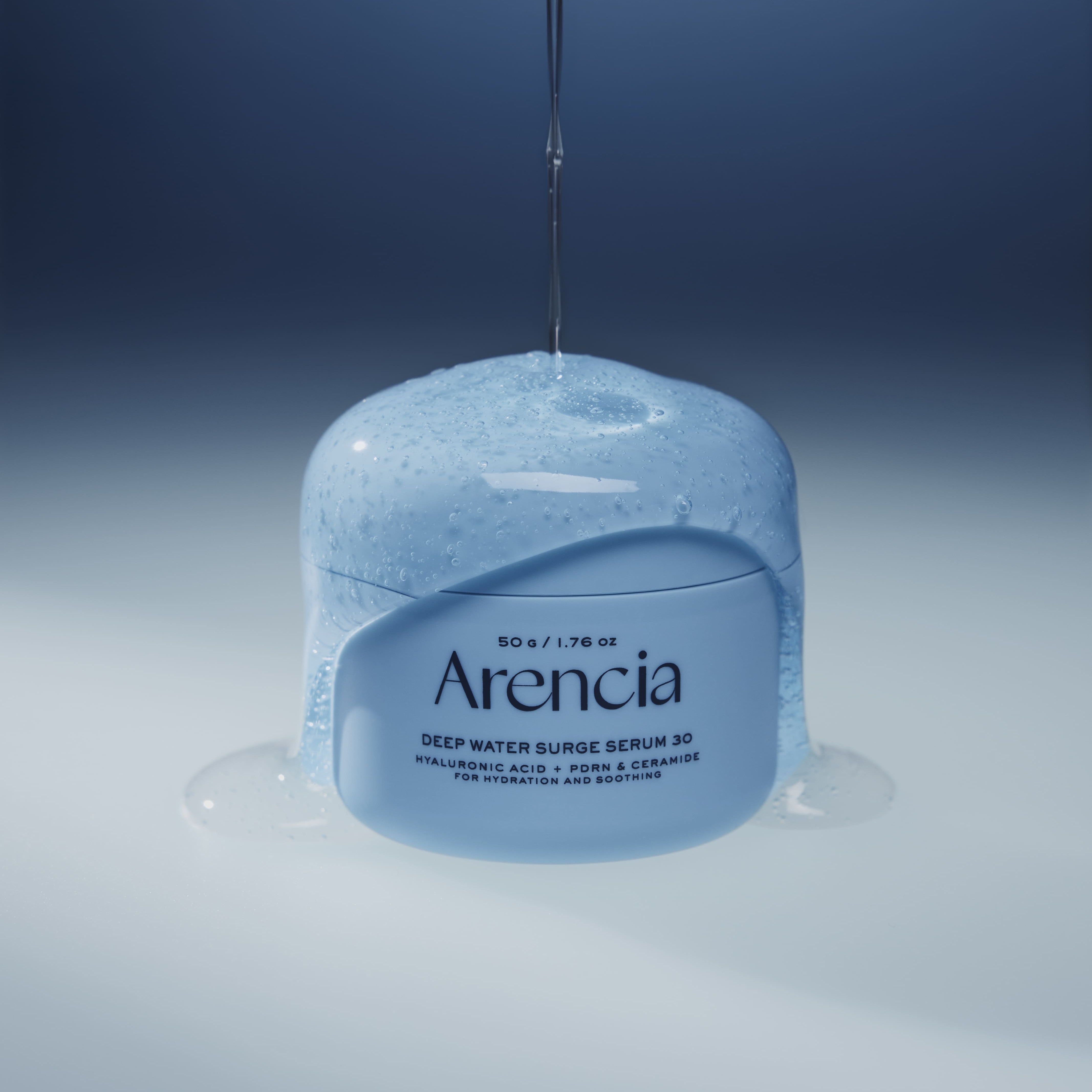 ARENCIA Deep Water Surge Serum 30 50g with hydrating formula dripping on blue jar.