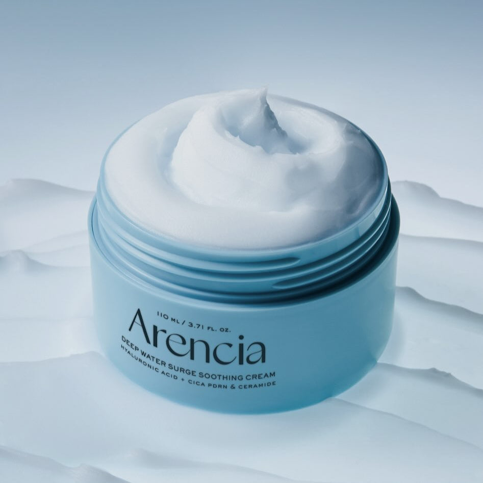 ARENCIA Deep Water Surge Soothing Cream 80ml in an open jar on a textured surface