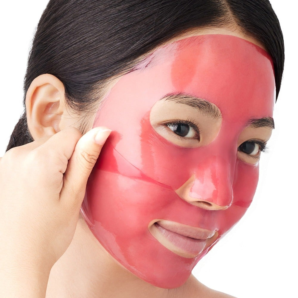 Woman applying ARENCIA Red Collagen Gel Mask 4 Sheets for skincare.