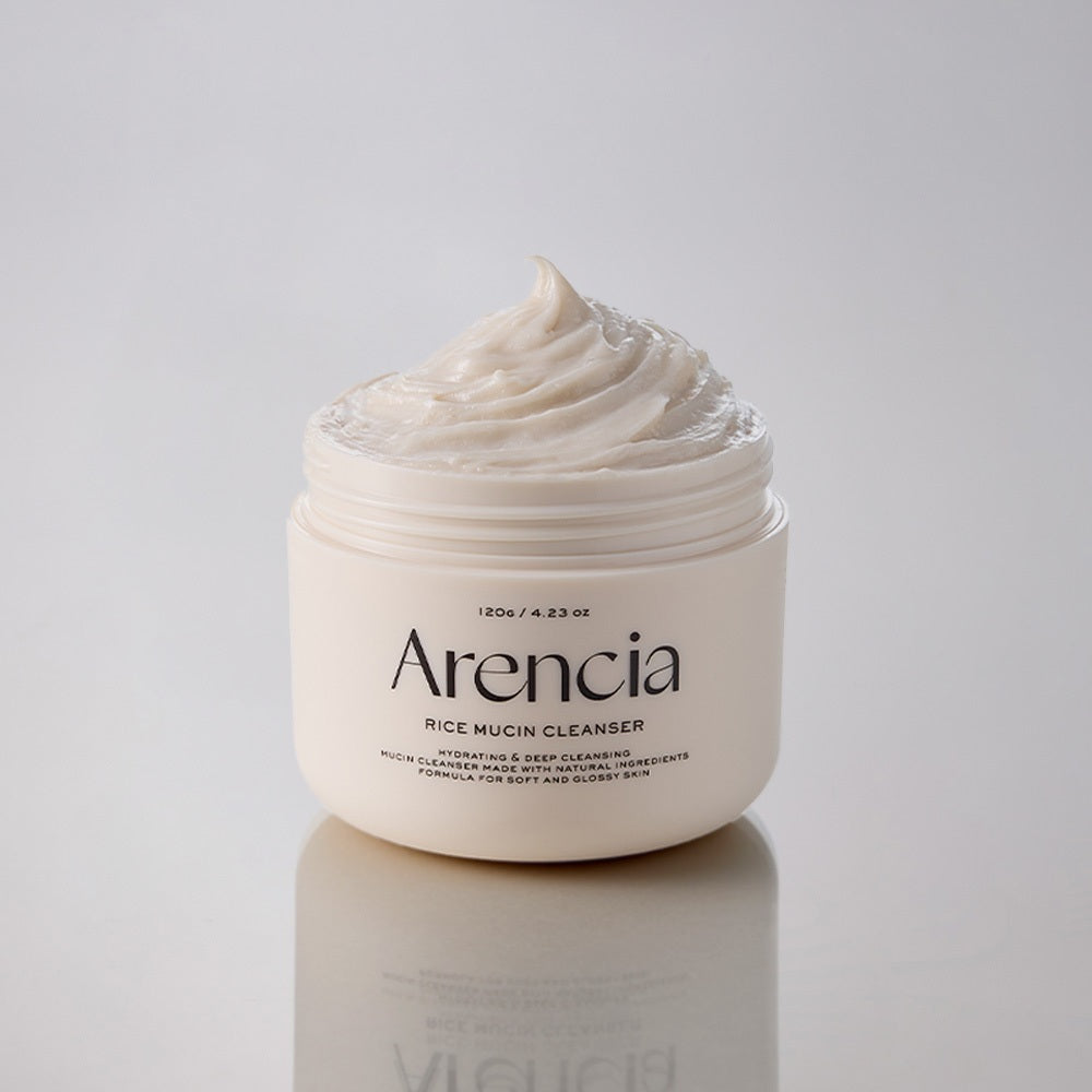 Open jar of ARENCIA Rice Mucin Cleanser 120g with creamy texture on display