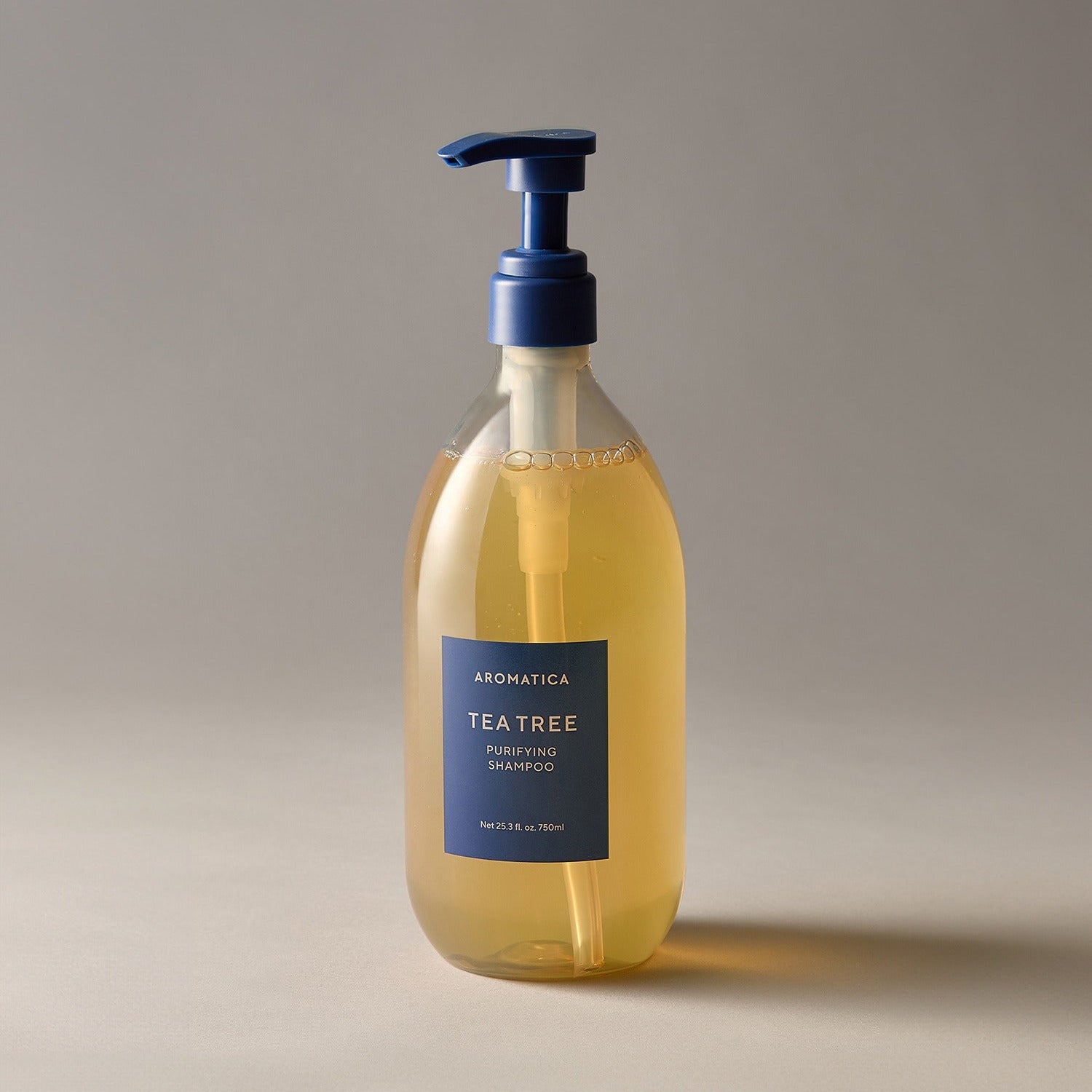 AROMATICA Tea Tree Purifying Shampoo 750ML bottle with pump on neutral background