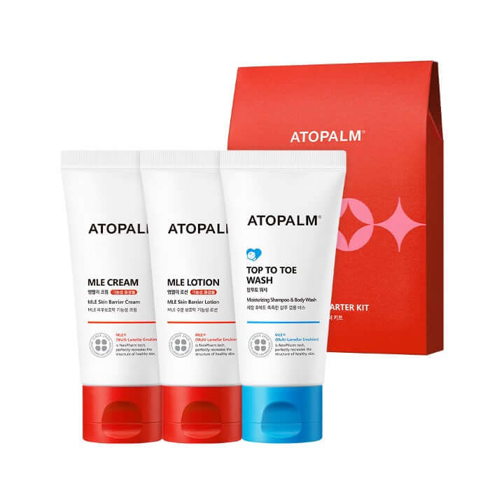 ATOPALM Essential Starter Kit featuring MLE Cream, Lotion, and Top to Toe Wash in front of the signature red packaging.