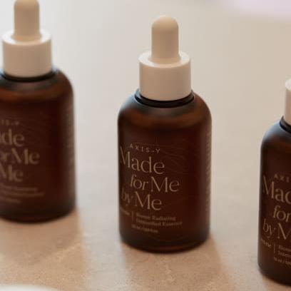 AXIS-Y Biome Radiating Intensified Essence 50ml bottles on display