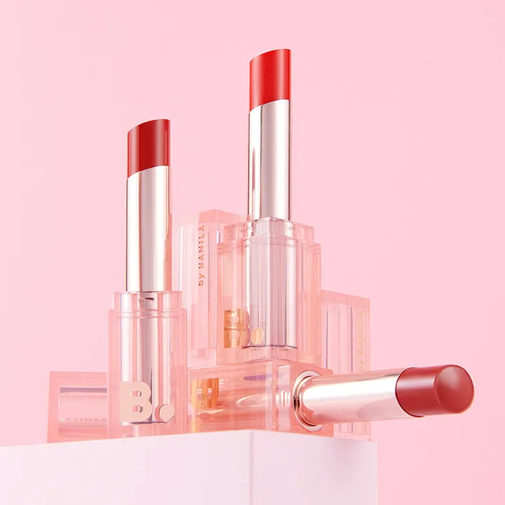 BANILA CO Glow Veil Lipstick in vibrant pink packaging, showcasing rich color and shine.
