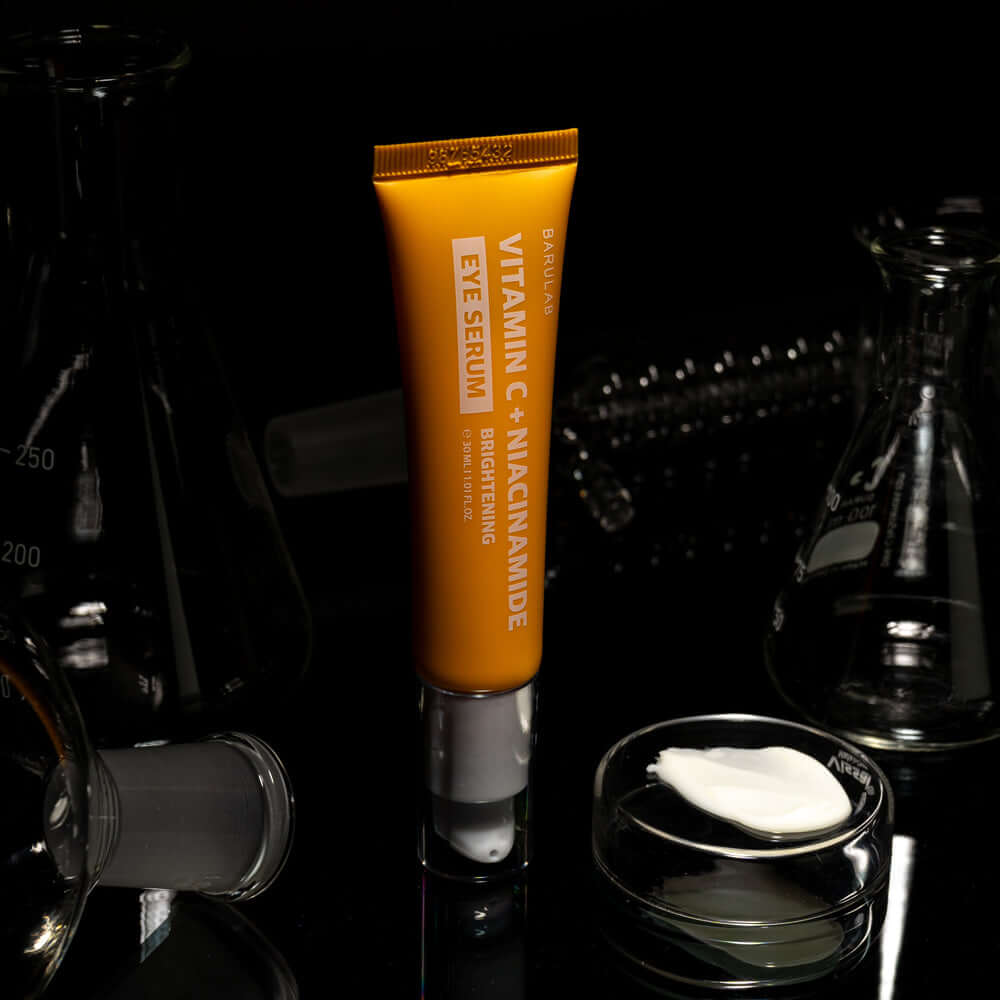 BARULAB Vitamin C Niacinamide Whitening Eye Serum 30ml on display with scientific glassware background.