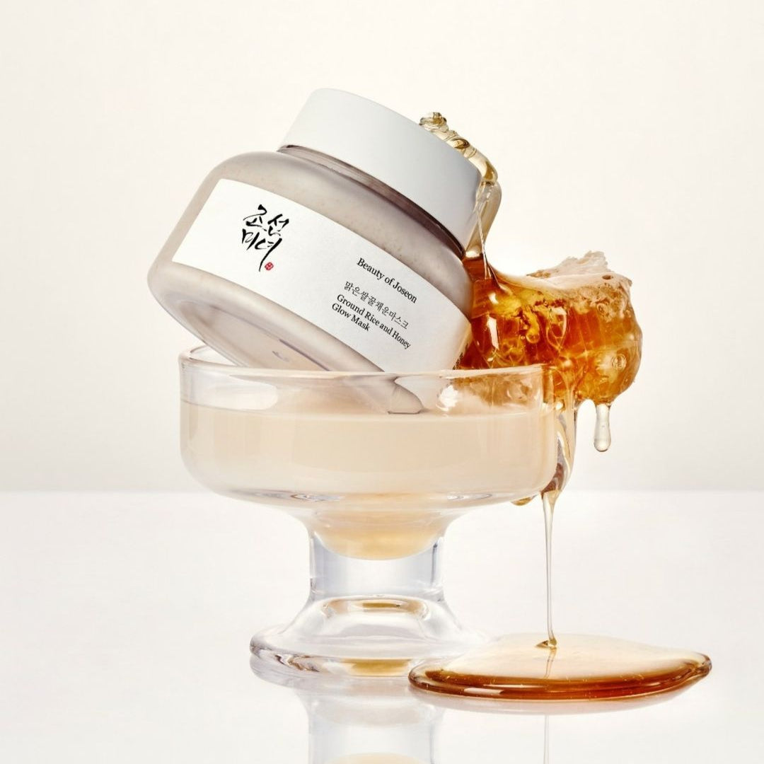 BEAUTY OF JOSEON Ground Rice and Honey Glow Mask 150ml in a glass container with honeycomb decoration, elegant skincare packaging.