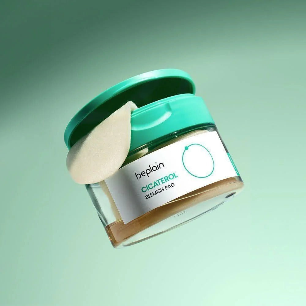 BEPLAIN Cicaterol Blemish Pad 80 sheets in green container with open lid for skincare treatment.