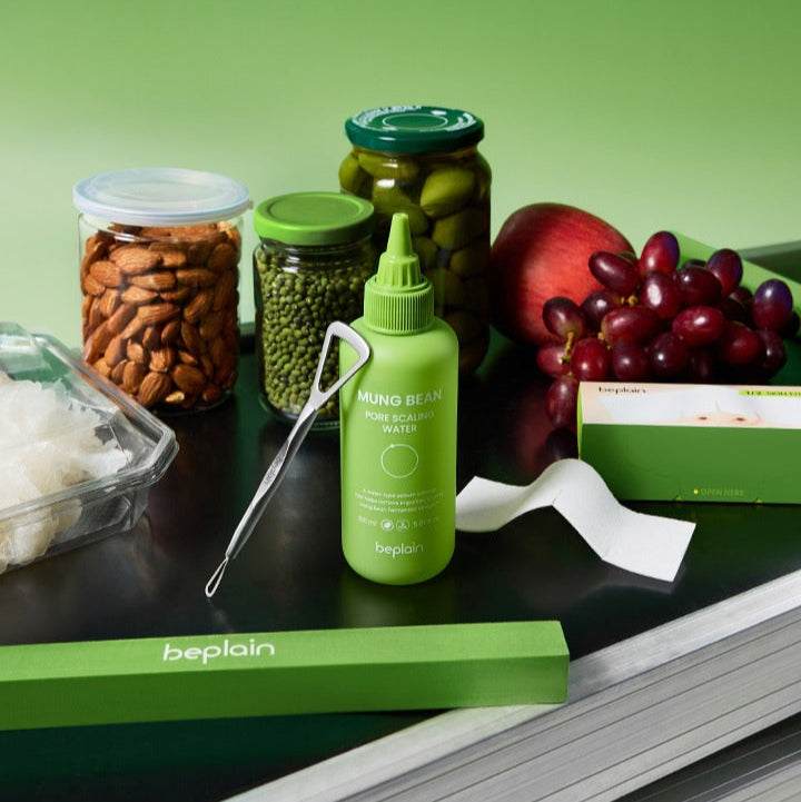 BEPLAIN Green Bean Pore Scaling Water 150ml bottle with assorted natural ingredients, featuring fresh produce and nuts.