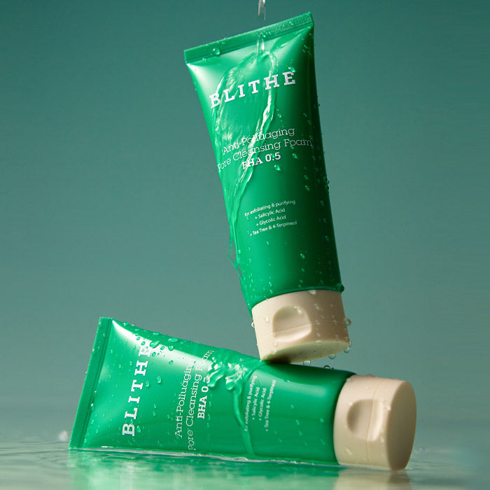 BLITHE Anti-Pollution Aging Pore Cleansing Foam BHA 0.5 150ml tubes on a green background with water droplets