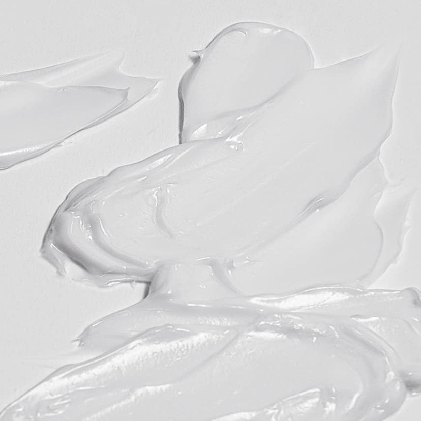 Texture of CELIMAX Dual Barrier Skin Wearable Cream 50ml showcasing its rich, creamy consistency for effective skin barrier protection.