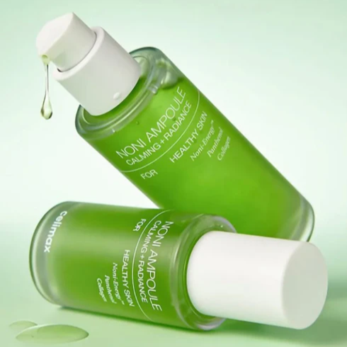 CELIMAX Noni Ampoule Calming+Radiance 30ml product image with green bottles, enhancing healthy skin with calming and radiance benefits.