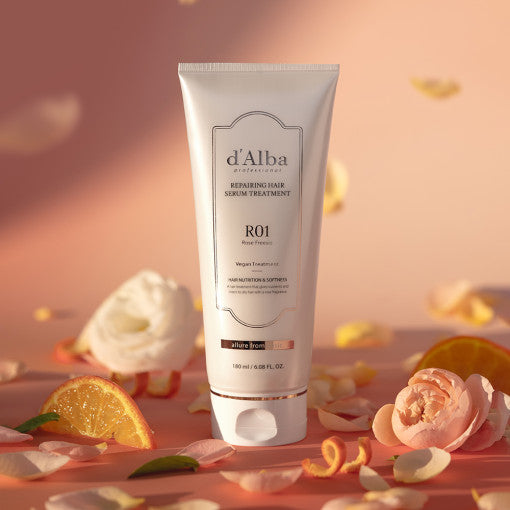D'ALBA Professional Repairing Hair Serum Treatment 180ml bottle with flowers and citrus slices backdrop