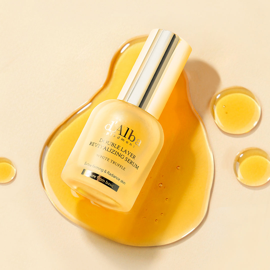 D'ALBA Vegan Double Serum 30ml bottle displayed on a background with golden liquid drops