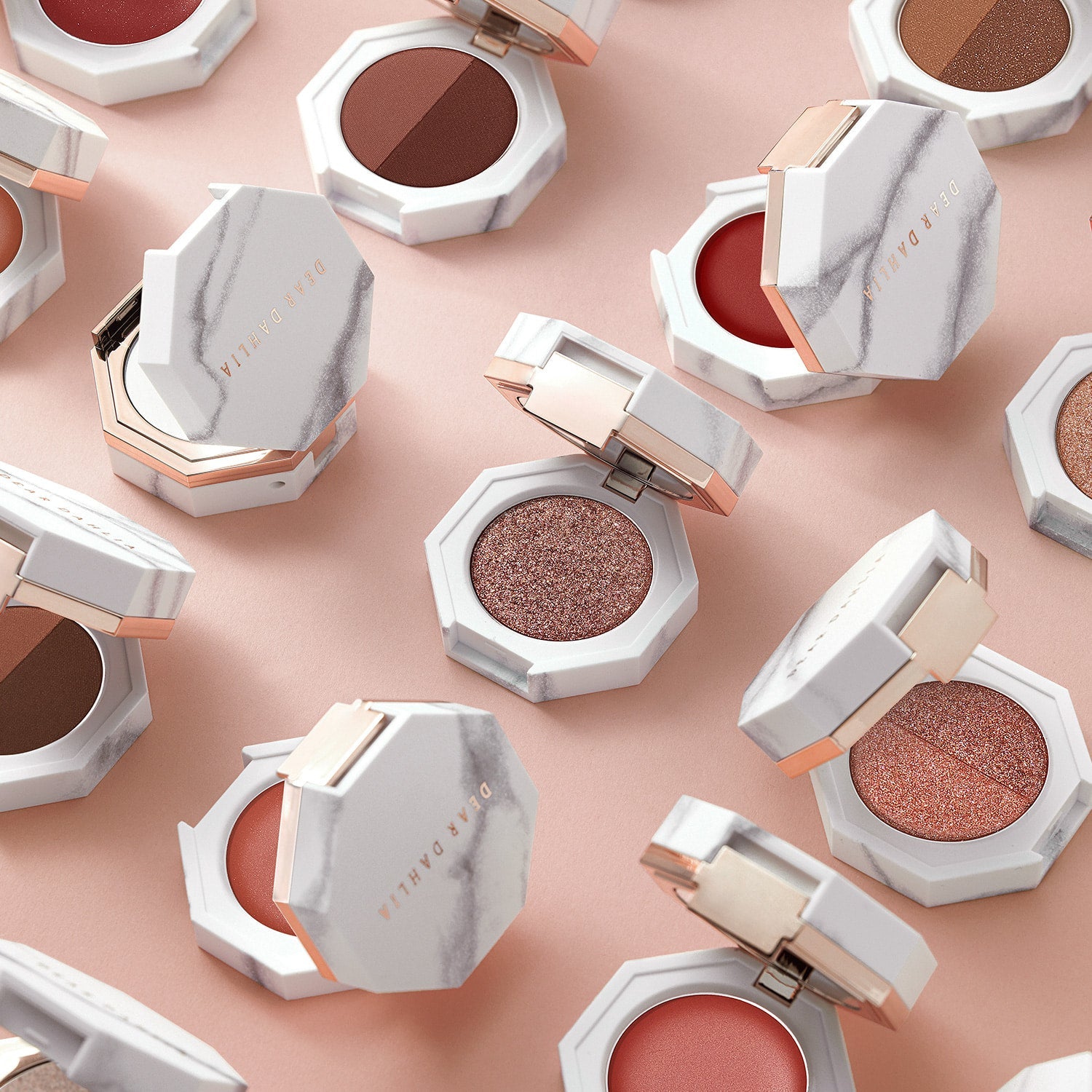 DEAR DAHLIA Paradise Dual Palette displayed with open and closed makeup compact cases on a soft pink surface.
