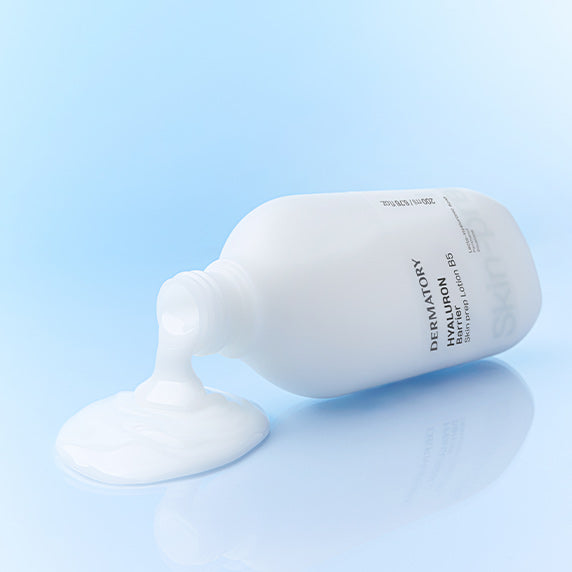DERMATORY Hyaluronic Barrier Skin Prep Lotion B5 200ml bottle laying on side with lotion pouring out against blue background.