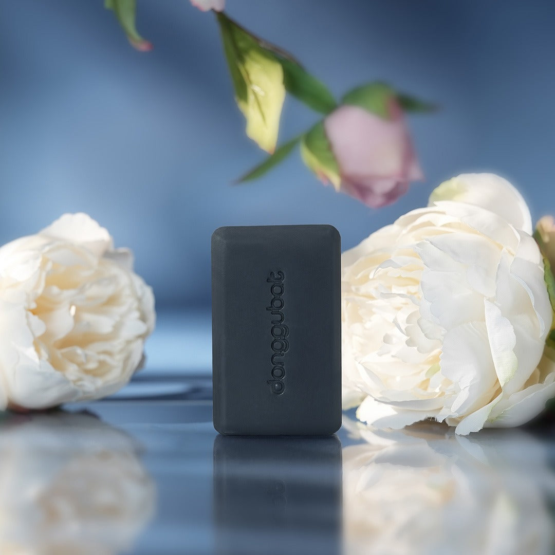 DONGGUBAT Field Blooming Perfume Shampoo Bar Repair 80g with white flowers background