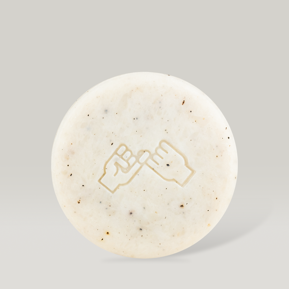 DONGGUBAT Field Correct Body Soap Noni bar with embossed design on a neutral background. Enhance skincare routine with natural ingredients.