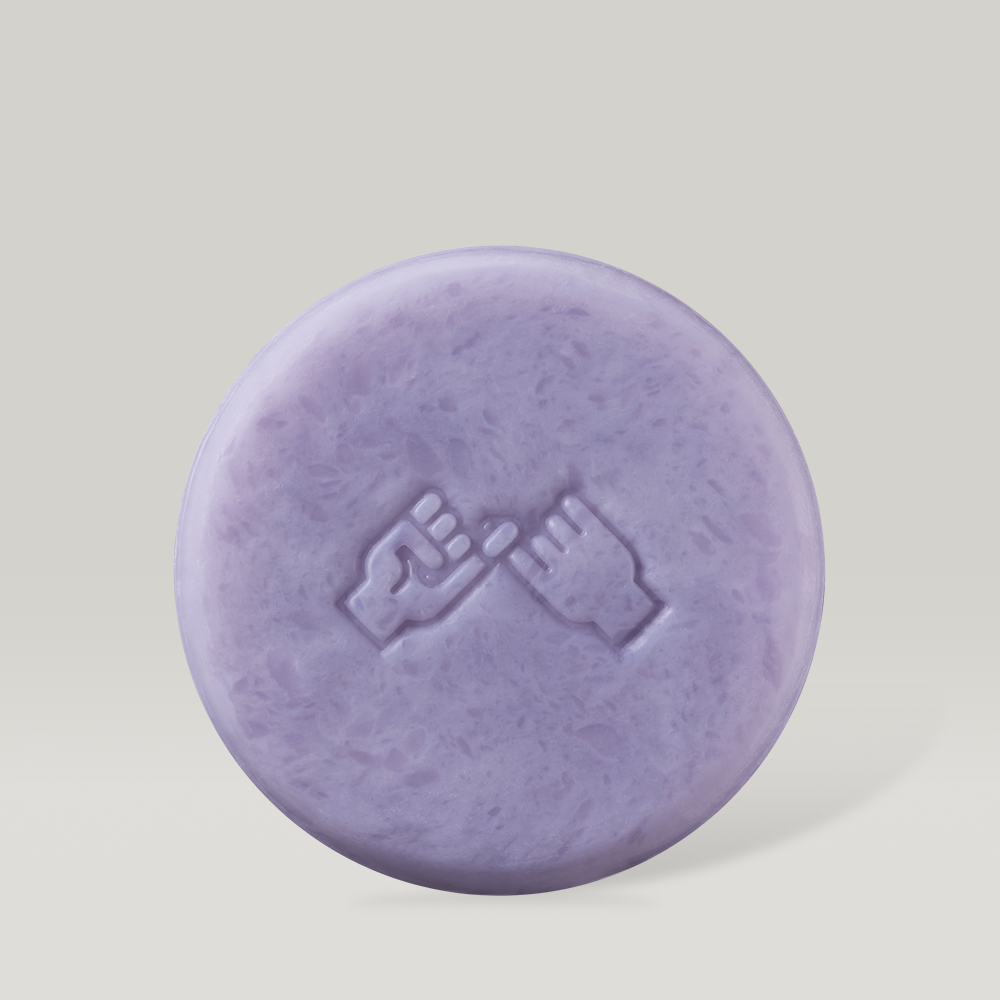 DONGGUBAT Field Correct Cleansing Soap Collagen shown in purple with engraved design