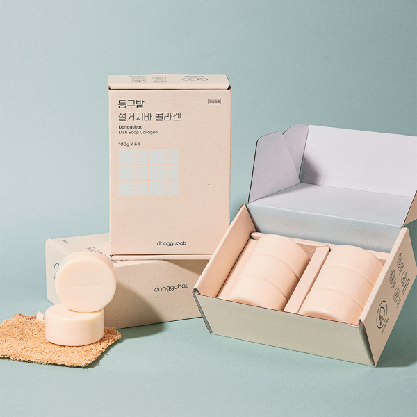 DONGGUBAT Soljiba Collagen 600g packaging with soap bars displayed in an open box on a textured surface.