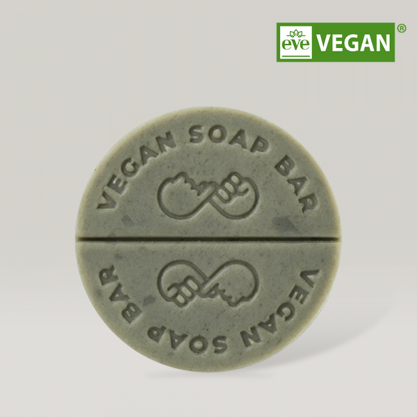 DONGGUBAT Vegan Dishwashing Soap Green Tea 100g, round soap bar with engraved design and vegan certification.